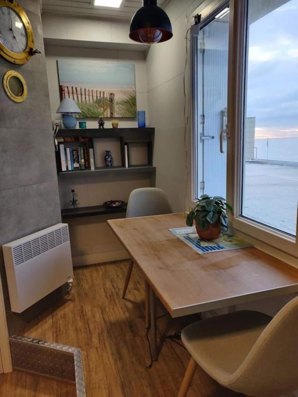 Dining and workspace area with sea view